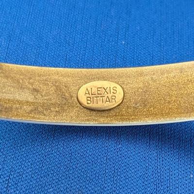 Pair of Alexis Bittar textured Lucite tapered bangle bracelets. Soft blue with gold inside.