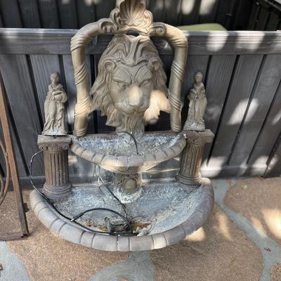 Metal lion fountain