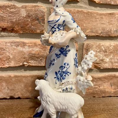 Blue and white figurine