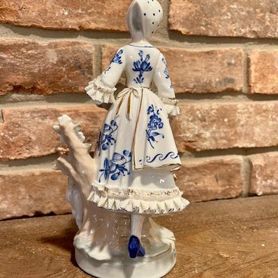 Blue and white figurine