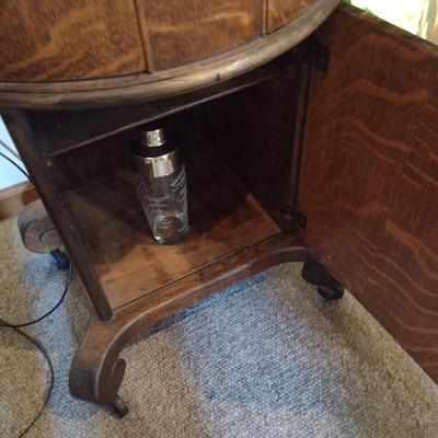 Antique Flame Mahogany Empire Drop Leaf Side Table Drum on Pedestal Design