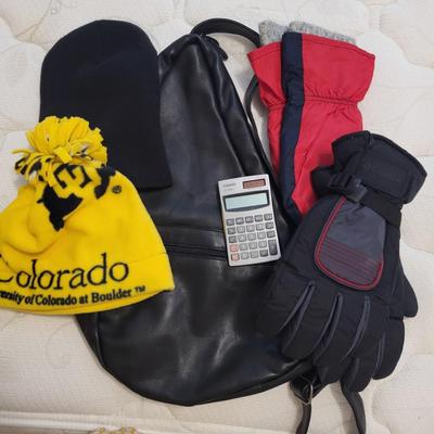 LEATHER SHOULDER PACK, WINTER GLOVES, CU HAT AND CALCULATOR