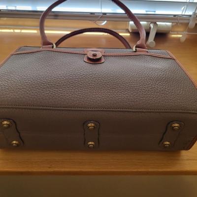 A GENUINE DOONEY BOURKE PURSE