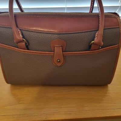 A GENUINE DOONEY BOURKE PURSE