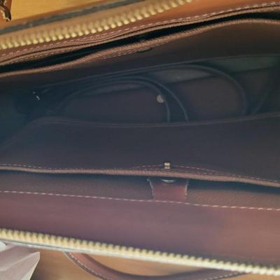 A GENUINE DOONEY BOURKE PURSE
