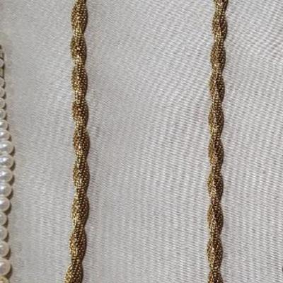 4 COSTUME NECKLACES