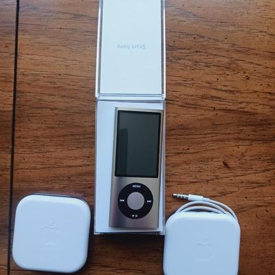 APPLE iPOD NANO AND 2 PAIRS OF EARBUDS