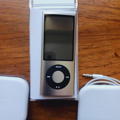 APPLE iPOD NANO AND 2 PAIRS OF EARBUDS