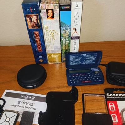 SPELLING CORRECTOR, SANDISKS, EAR PHONES, AND MORE