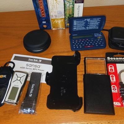 SPELLING CORRECTOR, SANDISKS, EAR PHONES, AND MORE
