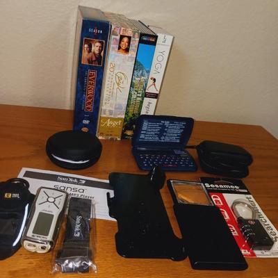 SPELLING CORRECTOR, SANDISKS, EAR PHONES, AND MORE
