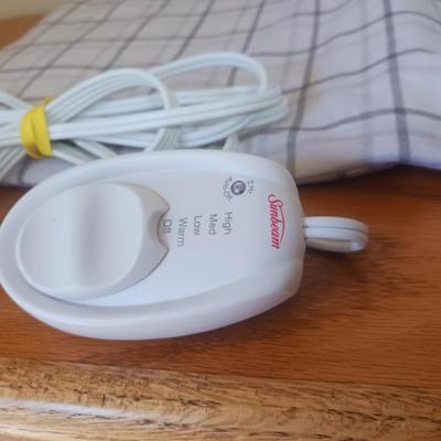 HEATING PAD AND HAIR CURLERS