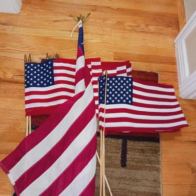 US FLAG ON STICKS AND CLOTH FLAG ON POLE