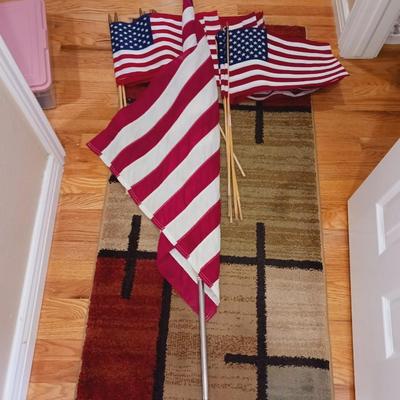 US FLAG ON STICKS AND CLOTH FLAG ON POLE