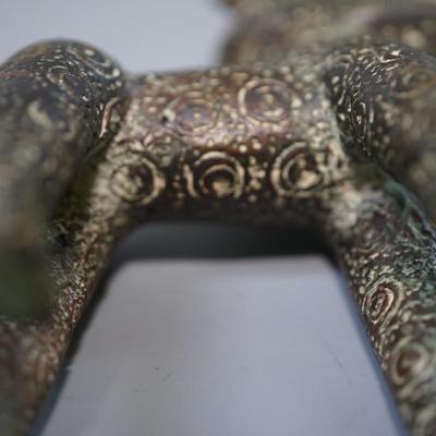 BRONZE STANDING DOGS /EMBOSSED CIRCLES/ FRONT TEETH PAWS AND TAILS. UNIQUE SCULPTURES