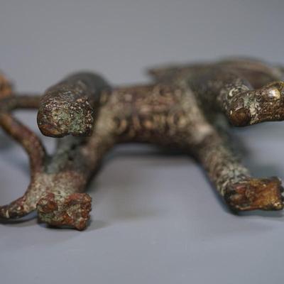 BRONZE STANDING DOGS /EMBOSSED CIRCLES/ FRONT TEETH PAWS AND TAILS. UNIQUE SCULPTURES