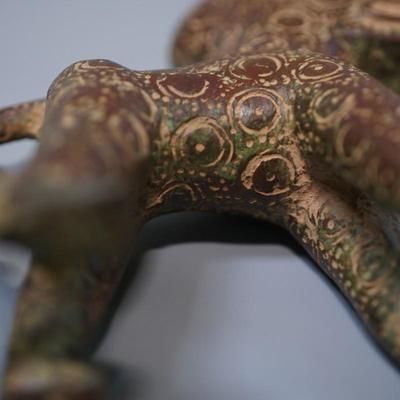 BRONZE STANDING DOGS /EMBOSSED CIRCLES/ FRONT TEETH PAWS AND TAILS. UNIQUE SCULPTURES