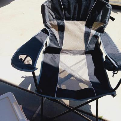 OZARK TRAIL FOLDING CHAIR, 2 FISHING POLES AND A COOLER