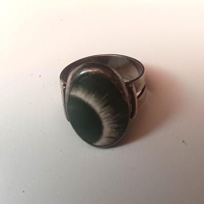STERLING SILVER RING WITH A CRESCENT STONE