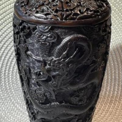 Vintage Chinese Black/Brown Carved Cinnabar 8.5" Tall Dragon Vase w/Wooden Stand in VG Preowned Condition.