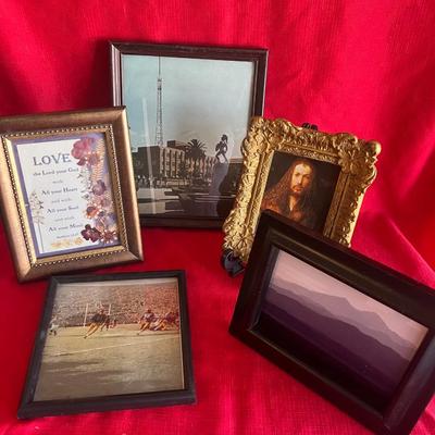 Several picture frames with pictures or your remove pictures and use the frames