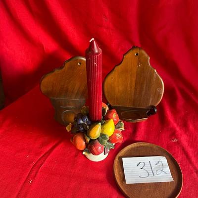 Two wooden wall shelves for candles, along with table decor, one small chip on the candle holder it is included