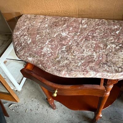 Marble top end tables or hall tables with a small drawer in the front There are a couple scratches, but they are in nice shape