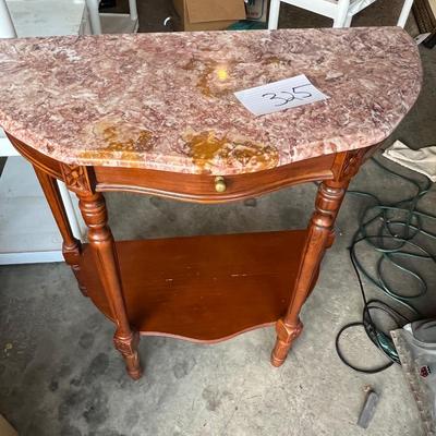 End tables or hallway tables half moon one table lake is in need of repair. There are a couple scratches and a little discoloration at...
