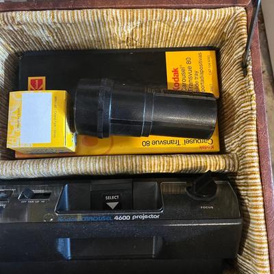 Kodak slide projector with attachments and Karrie case