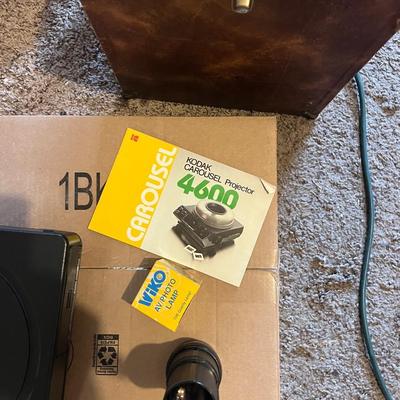 Kodak slide projector with attachments and Karrie case