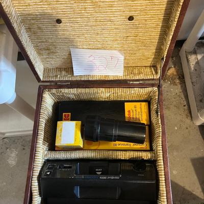 Kodak slide projector with attachments and Karrie case