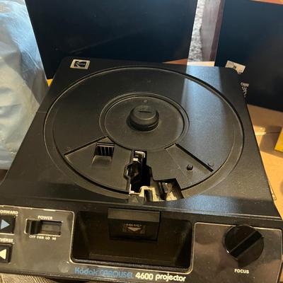 Kodak slide projector with attachments and Karrie case