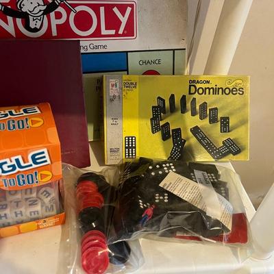 Variety of board games for family fun night Boggle monopoly Scrabble