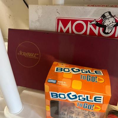 Variety of board games for family fun night Boggle monopoly Scrabble