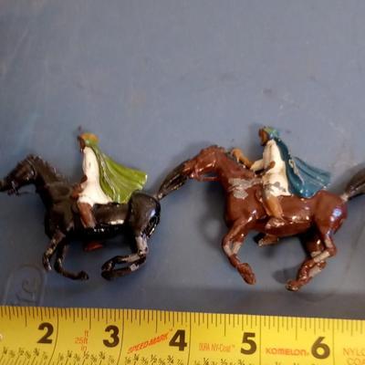 LOT 146 TWO OLD ARAB METAL RIDERS