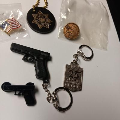 FIREARMS ADVERTISING & OTHER PINS AND KEYCHAINS (1)