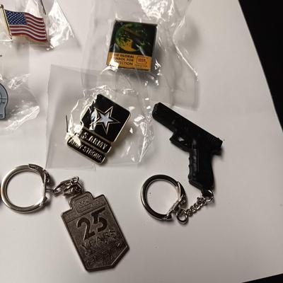 FIREARMS ADVERTISING & OTHER PINS AND KEYCHAINS