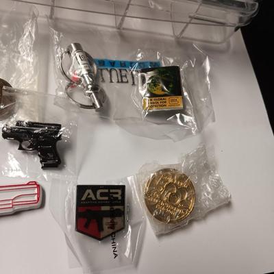 FIREARMS ADVERTISING & OTHER PINS AND KEYCHAINS PLUS 2 SECTIONED BOXES