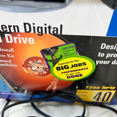 Vintage electronics, CD player, hard drives, plug covers