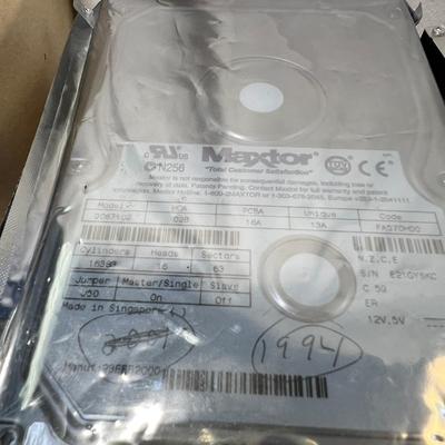 Vintage electronics, CD player, hard drives, plug covers
