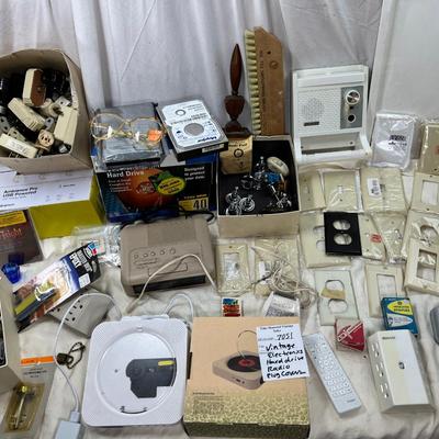 Vintage electronics, CD player, hard drives, plug covers