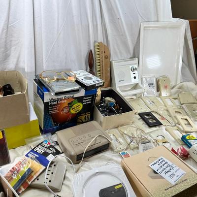 Vintage electronics, CD player, hard drives, plug covers