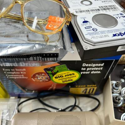 Vintage electronics, CD player, hard drives, plug covers