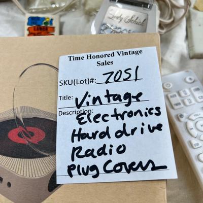 Vintage electronics, CD player, hard drives, plug covers