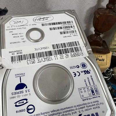Vintage electronics, CD player, hard drives, plug covers