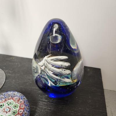 Pair of paperweights and a stemmed rosebowl