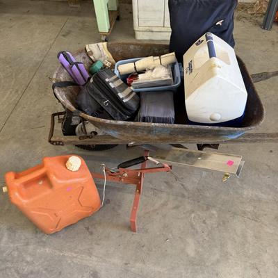 Wheelbarrow, lunch boxes, skeet thrower