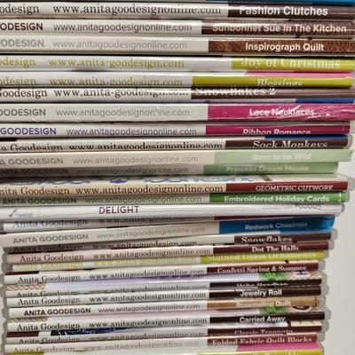 Stack of embroidery disks (plastic cases)