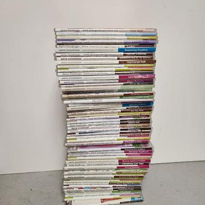 Stack of embroidery disks (plastic cases)