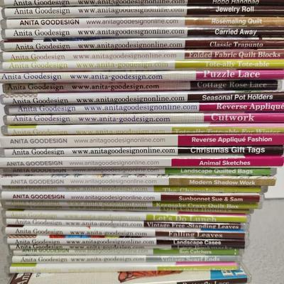 Stack of embroidery disks (plastic cases)